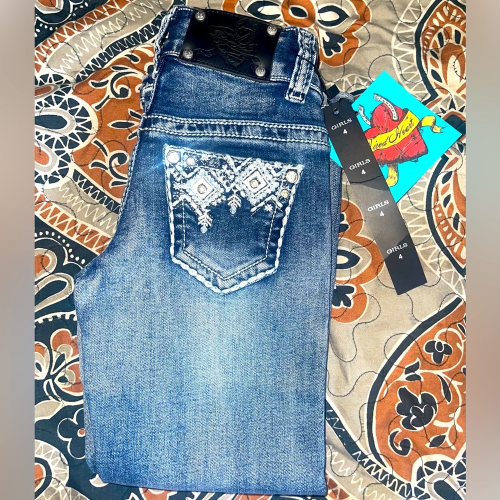 New with tags girls WIRED HEART jeans size 4 with adjustable waistband.